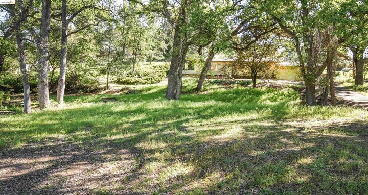 Property Photo:  18191 Woodham Carne Rd  CA 95370 