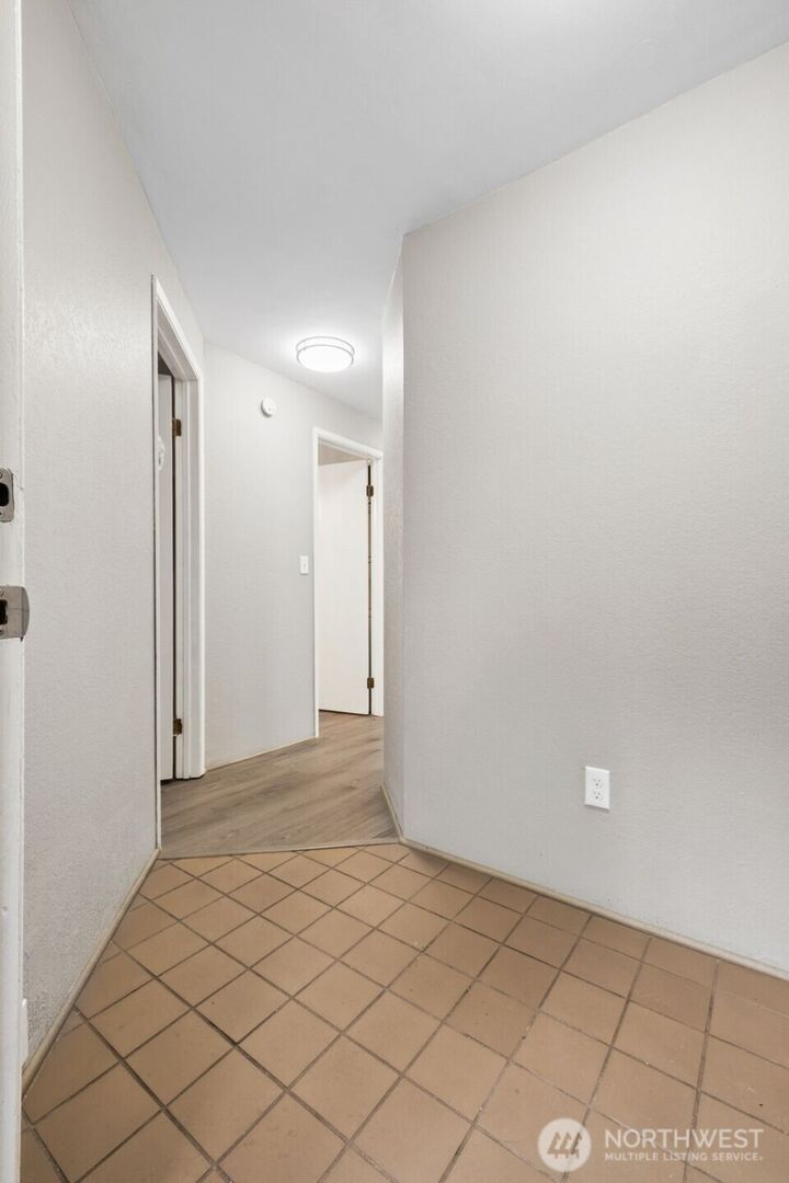 Property Photo:  15715  4th Avenue S 21  WA 98148 