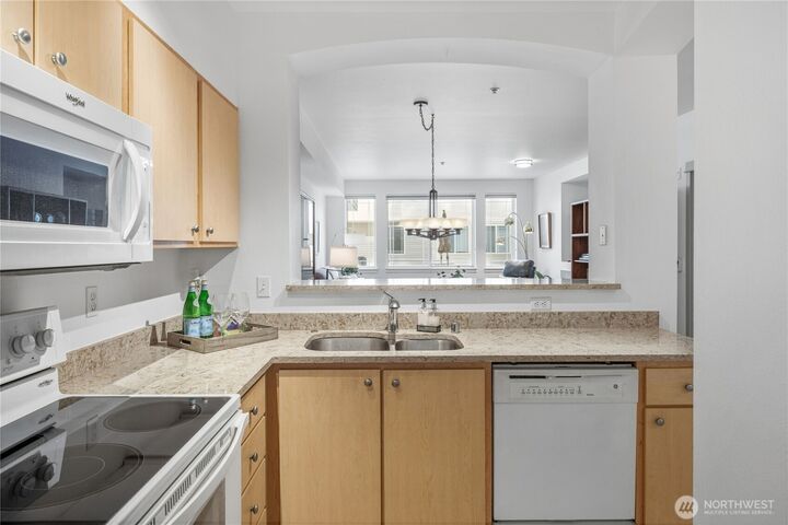 Property Photo:  13301 SE 79th Place B107  WA 98059 