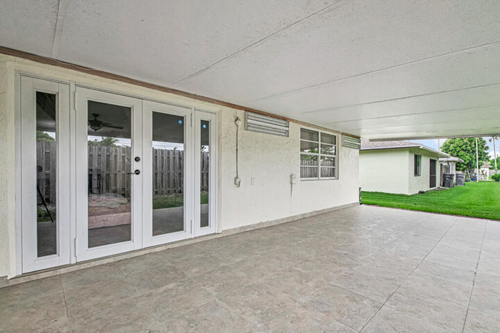 Property Photo:  4917 Luqui Court  FL 33415 