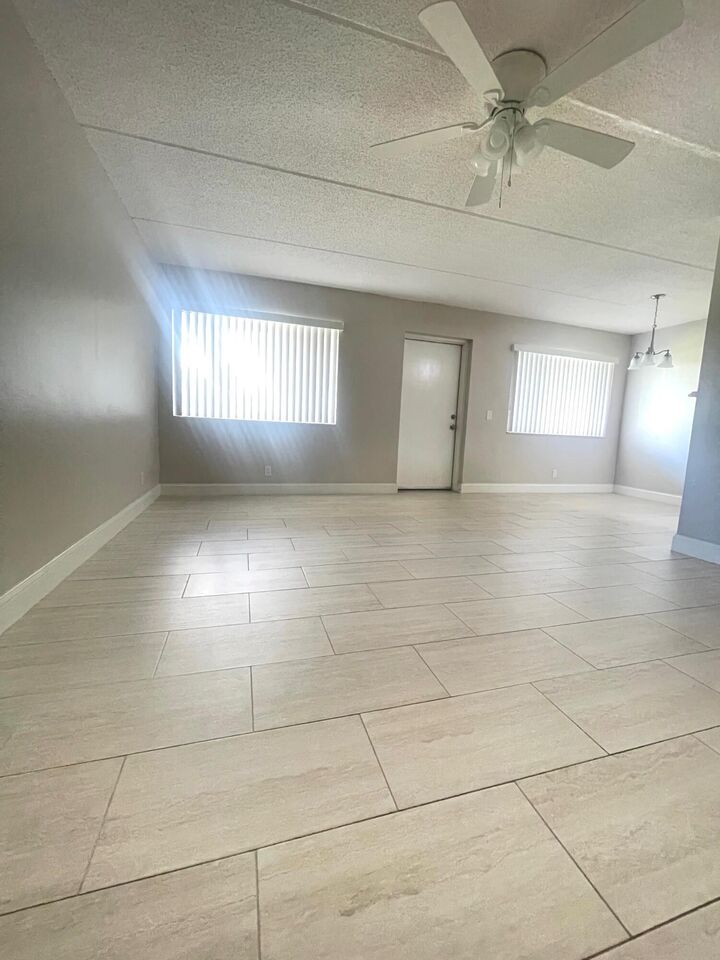 Property Photo:  100 Village Green Circle E 112  FL 33461 