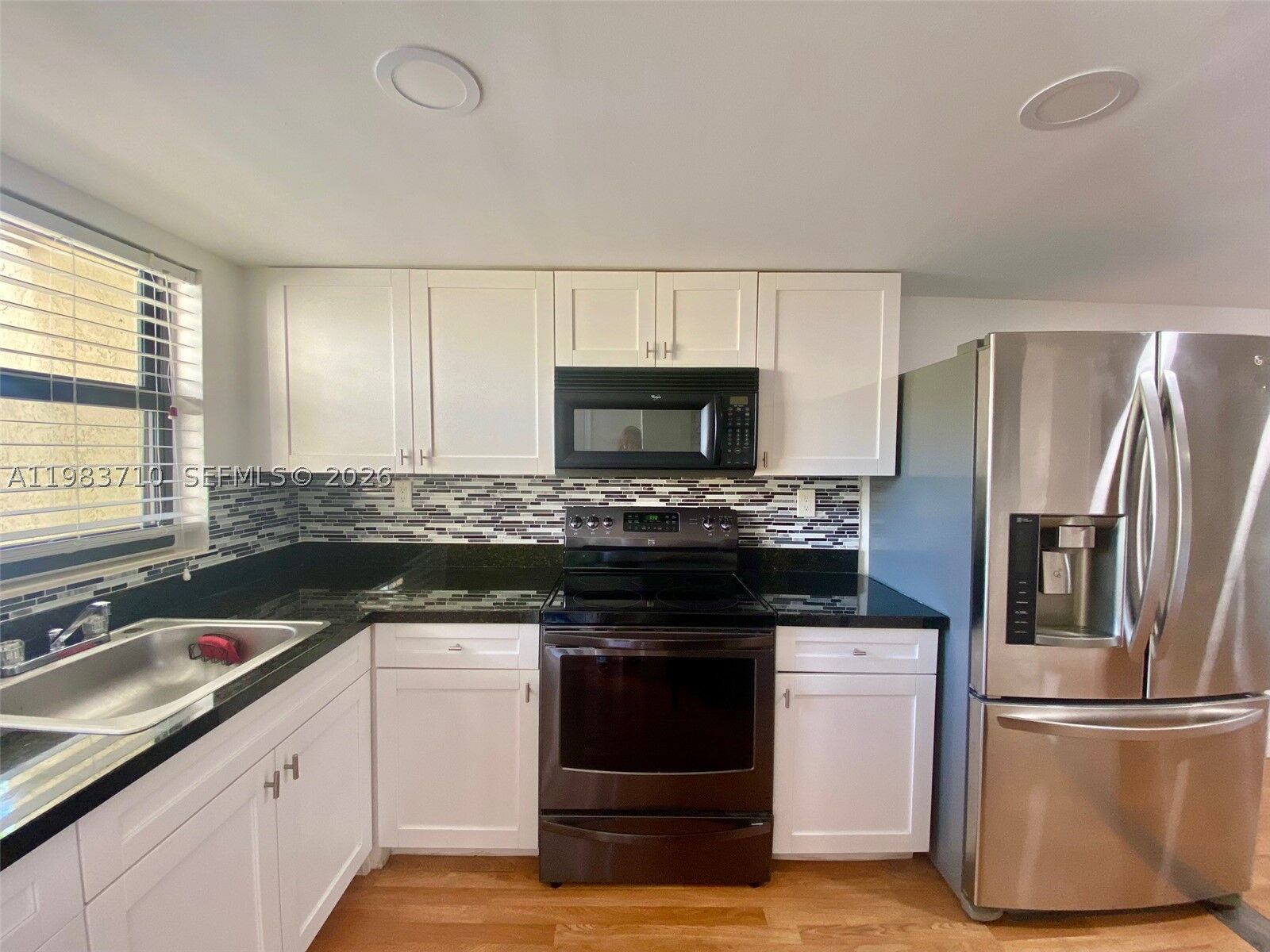 Property Photo: 8975 Palm Tree Ln 8975 FL 33024