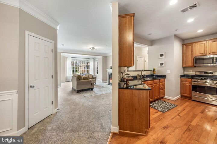 Property Photo:  701 Cobblestone Boulevard 203  VA 22401 