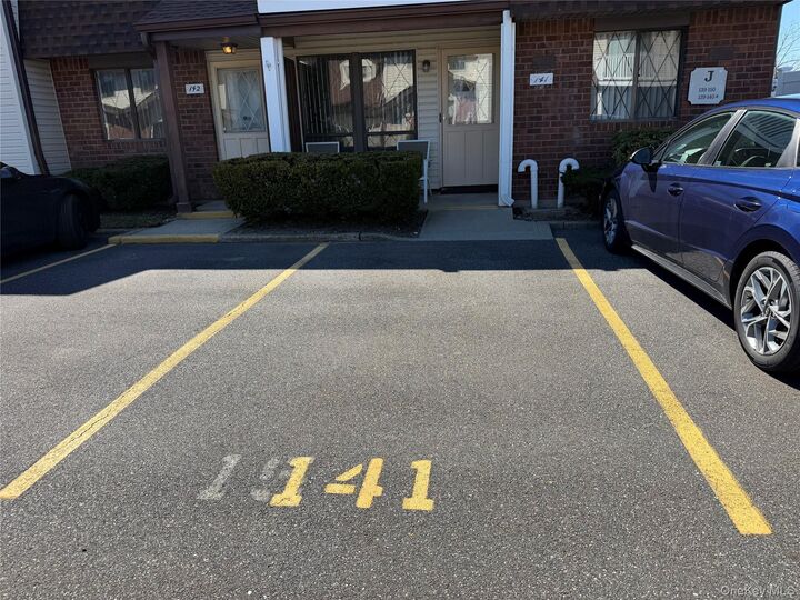 Property Photo: 141 Cambridge Drive E 141 NY 11726