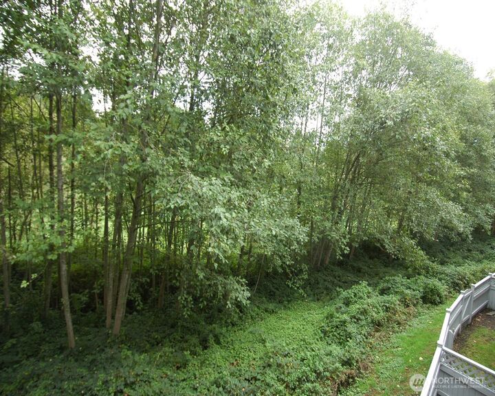 Property Photo:  12720 NE 10th Place D 202  WA 98007 