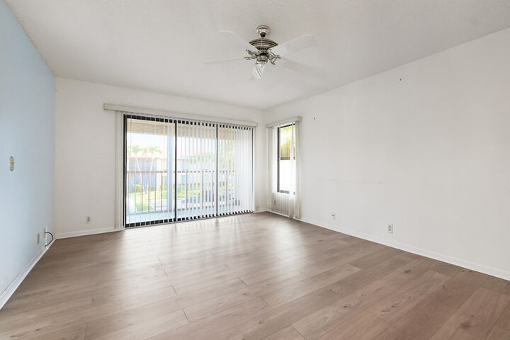 Property Photo:  801 Sky Pine Way A2  FL 33415 