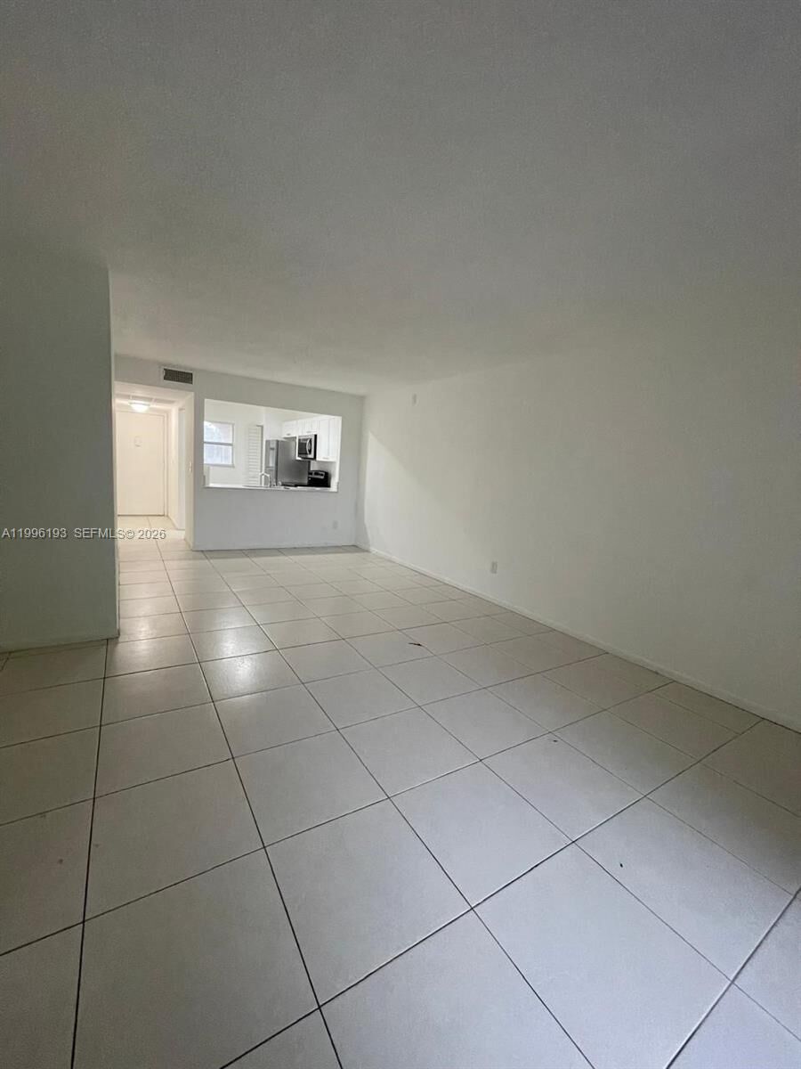 Property Photo:  861 NE 209th Ter 204-24  FL 33179 