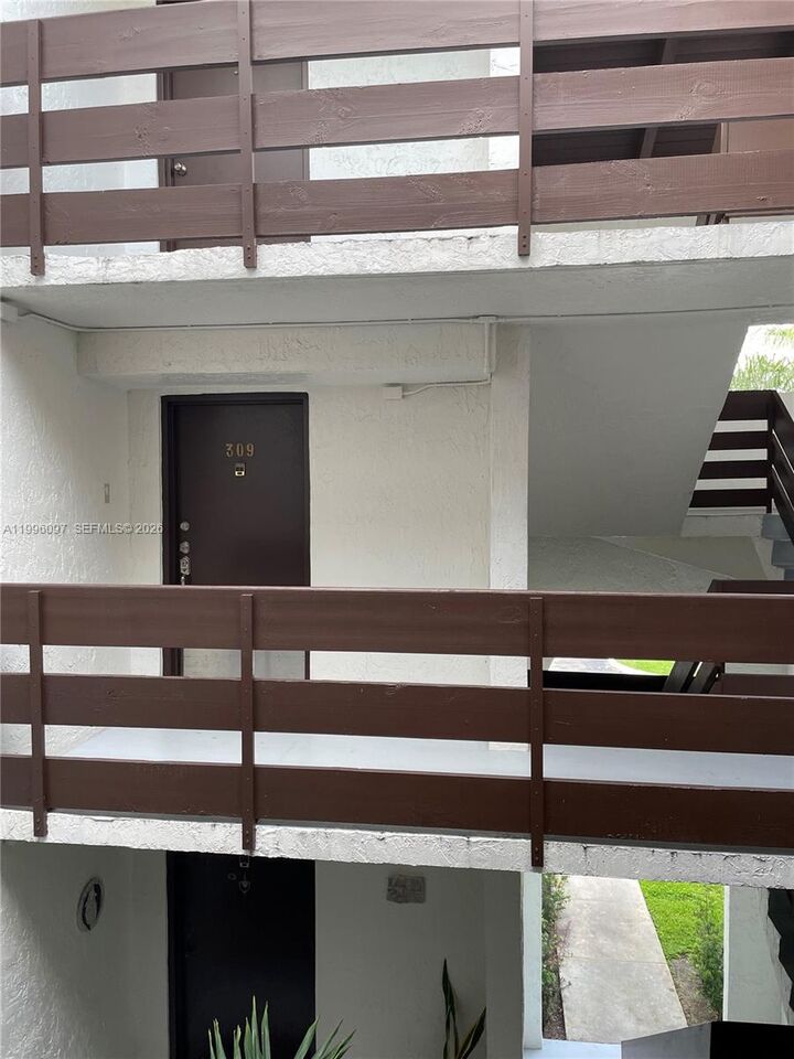 Property Photo:  9140 SW 123rd Ct 309  FL 33186 