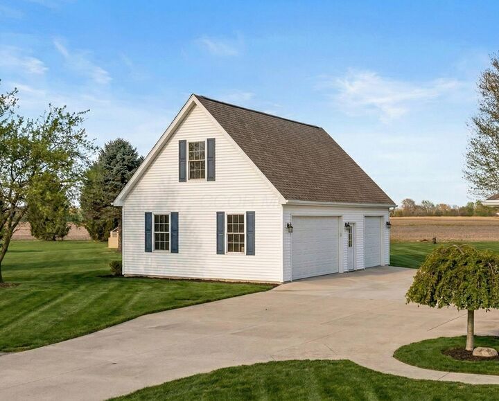 Property Photo: 4645 Meadowgrove NW Drive OH 43112