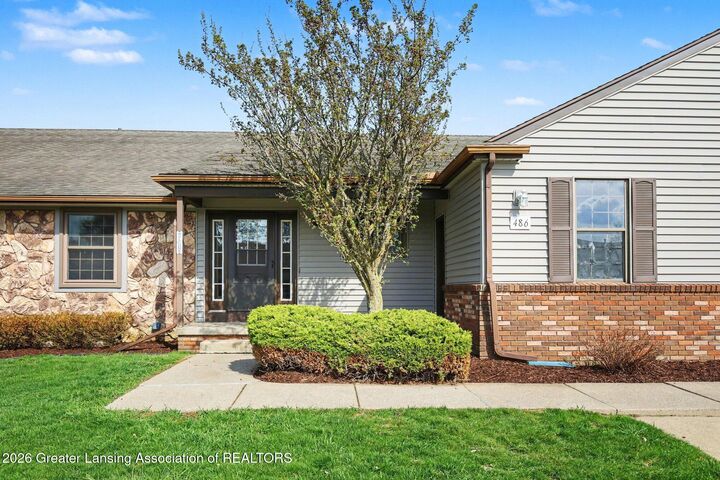 Property Photo:  486 Red Cedar Boulevard  MI 48895 