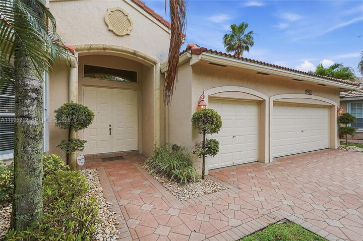 Property Photo:  5936 NW 54th Cir  FL 33067 