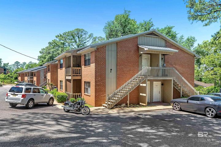 Property Photo:  512 Lake Forest Boulevard 123F  AL 36526 