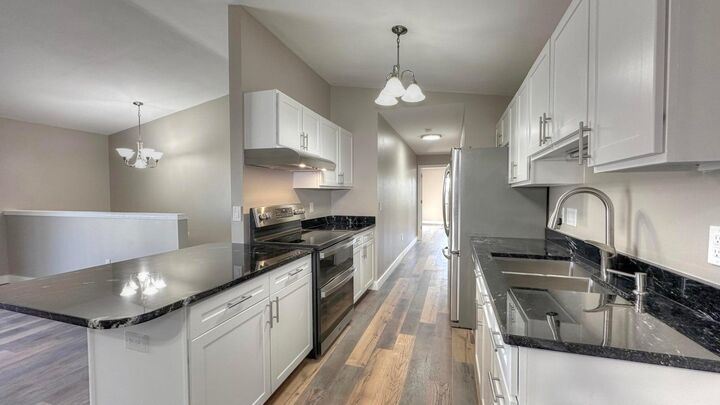 Property Photo: 7311 98th Ave F - 3 53142