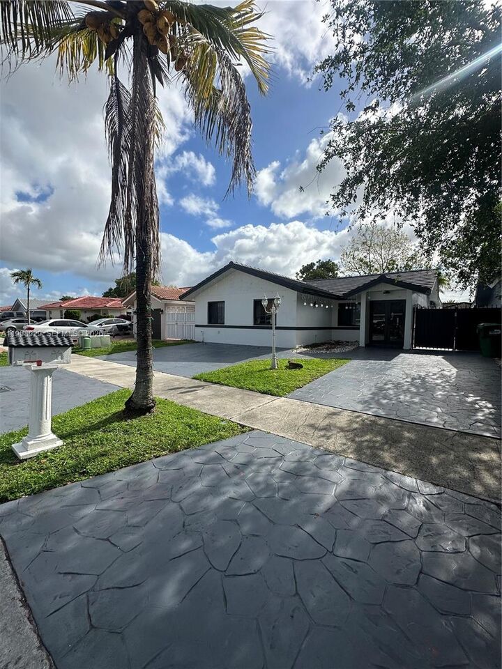 Property Photo:  5923 SW 147th Pl  FL 33193 