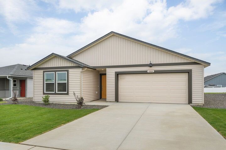 Property Photo:  1808 E Boskoop St  WA 99006 