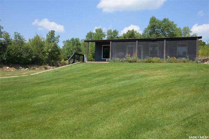 Property Photo:  719 Pasqua Lake Road  SK S0G 1S0 