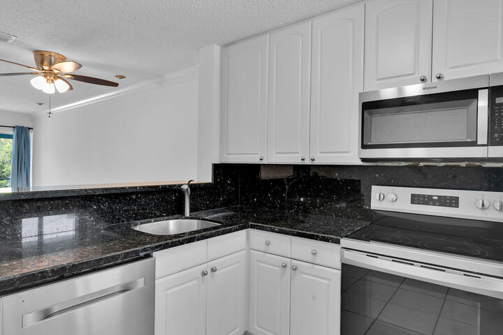 Property Photo:  98402 Windward Avenue 98402  FL 33037 