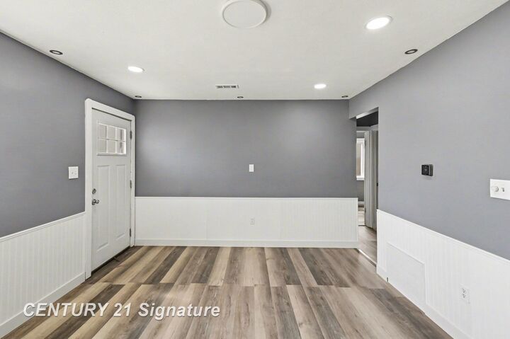 Property Photo:  1203 Warwick Drive  MI 48910 