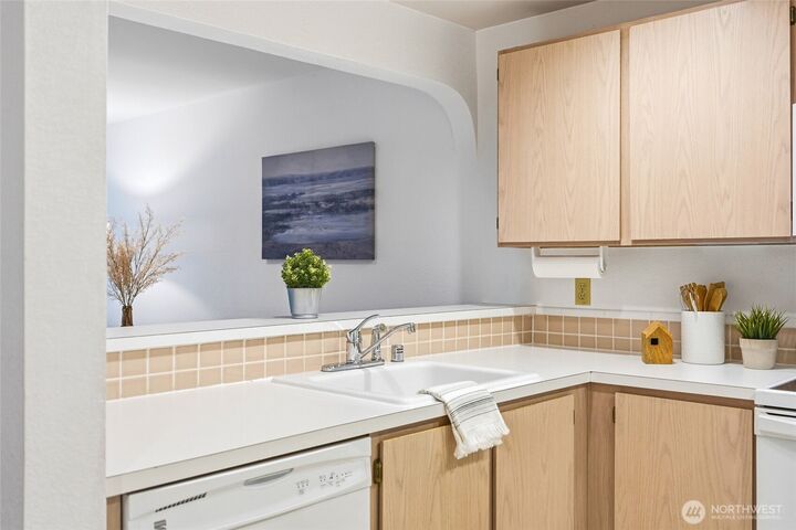 Property Photo:  12720 NE 10th Place D105  WA 98005 