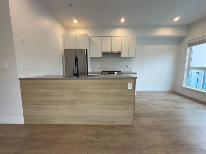 Property Photo: 8496 120 Street 213 BC V3W 3N5