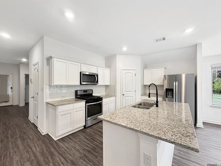 Property Photo:  7747 Joe Lynn Trails  LA 70726 