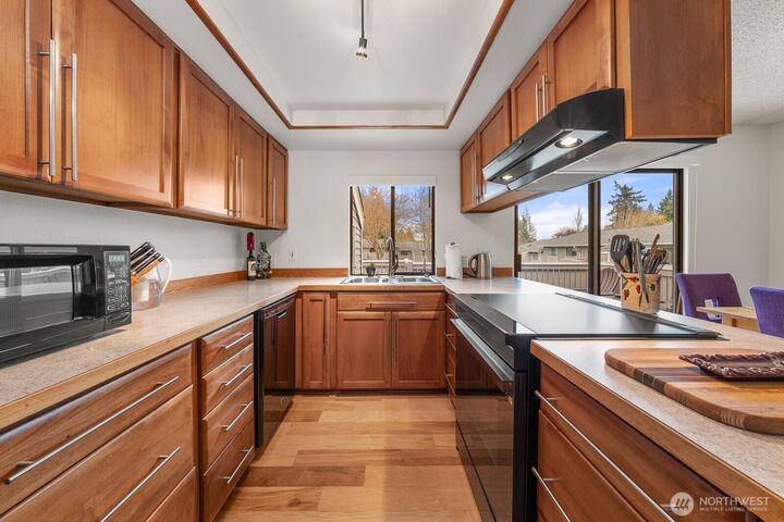 Property Photo:  9918 NE 144th Lane 406  WA 98034 