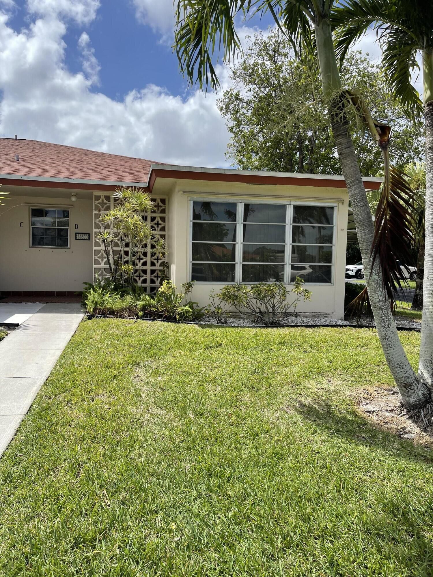 Property Photo:  4530 NW 2nd Street D  FL 33445 