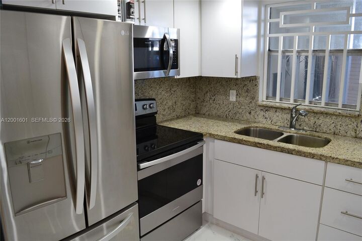 Property Photo: 220 NW 87th Ave K110 FL 33172