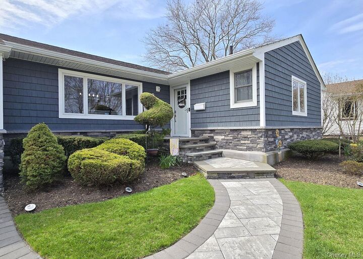 Property Photo: 22 Clifford Drive NY 11735