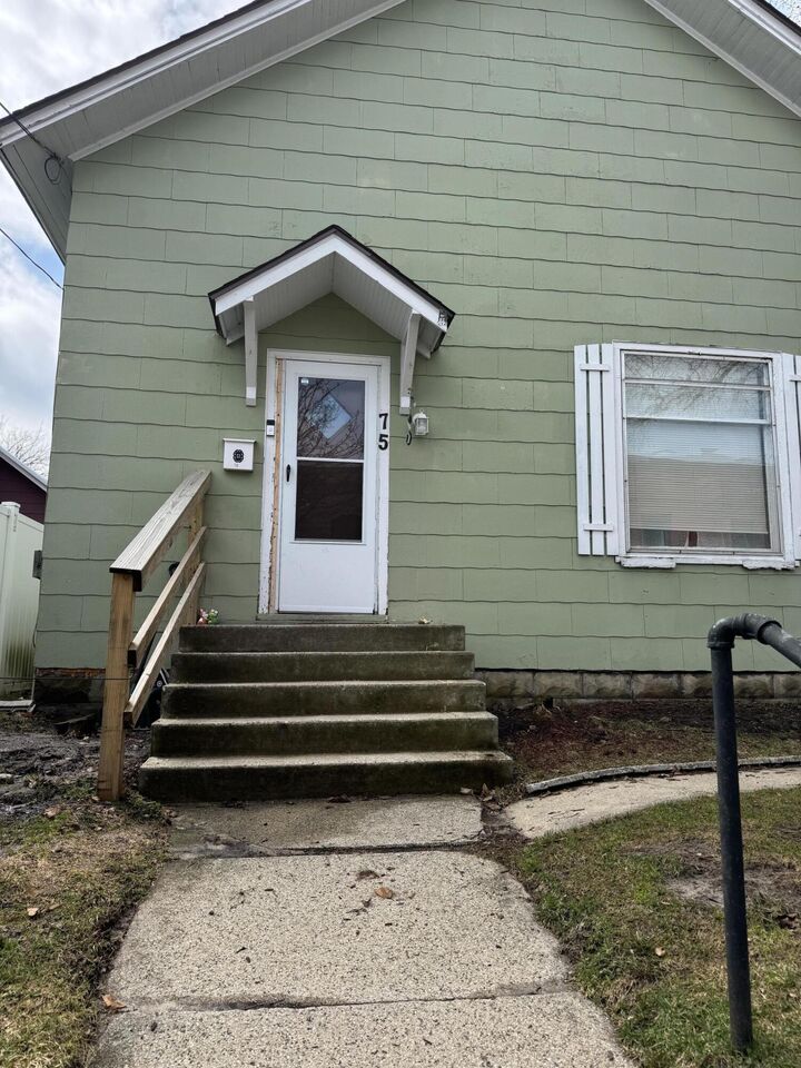 Property Photo:  75 Filer Street  MI 49660 