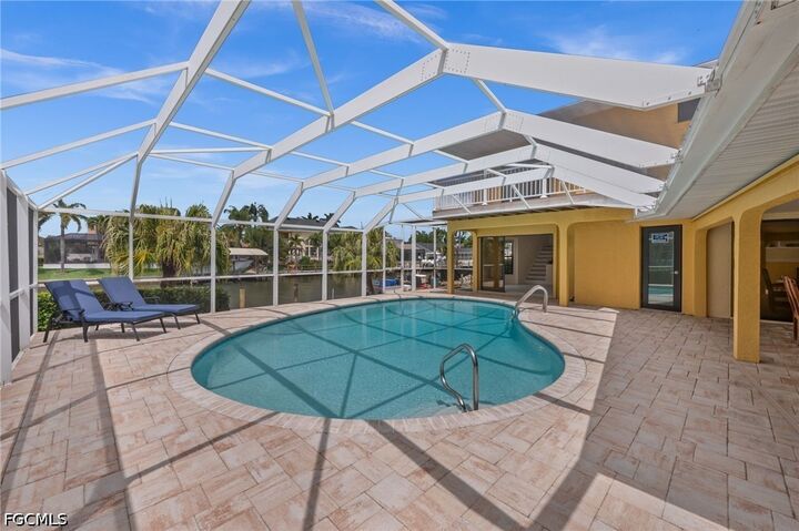 Property Photo:  1223 SW 51st Street  FL 33914 