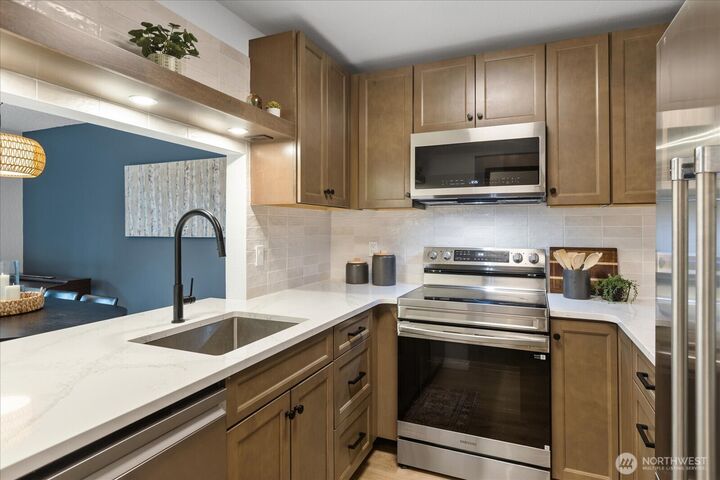 Property Photo:  21615  80th Avenue W 215  WA 98026 