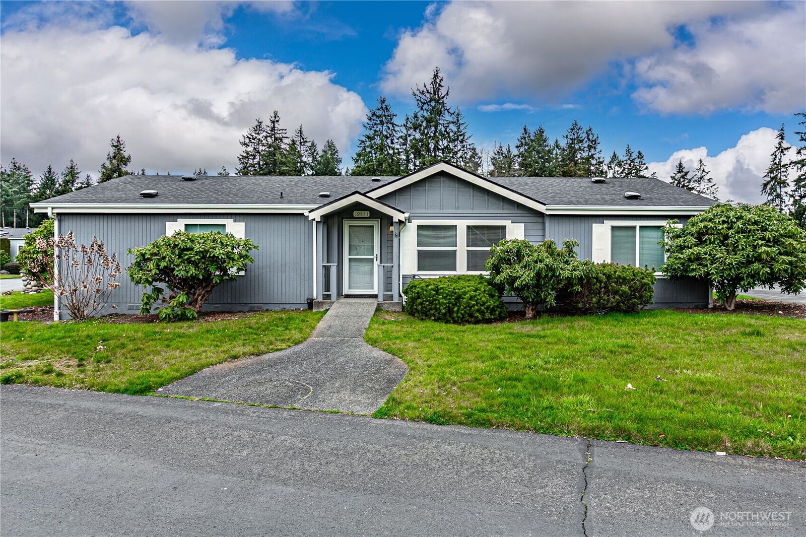 Property Photo:  19513  100th Avenue Ct E 28  WA 98338 
