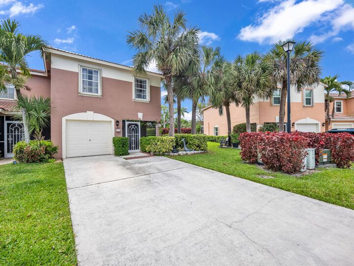 Property Photo:  6887 Willow Creek Run  FL 33463 