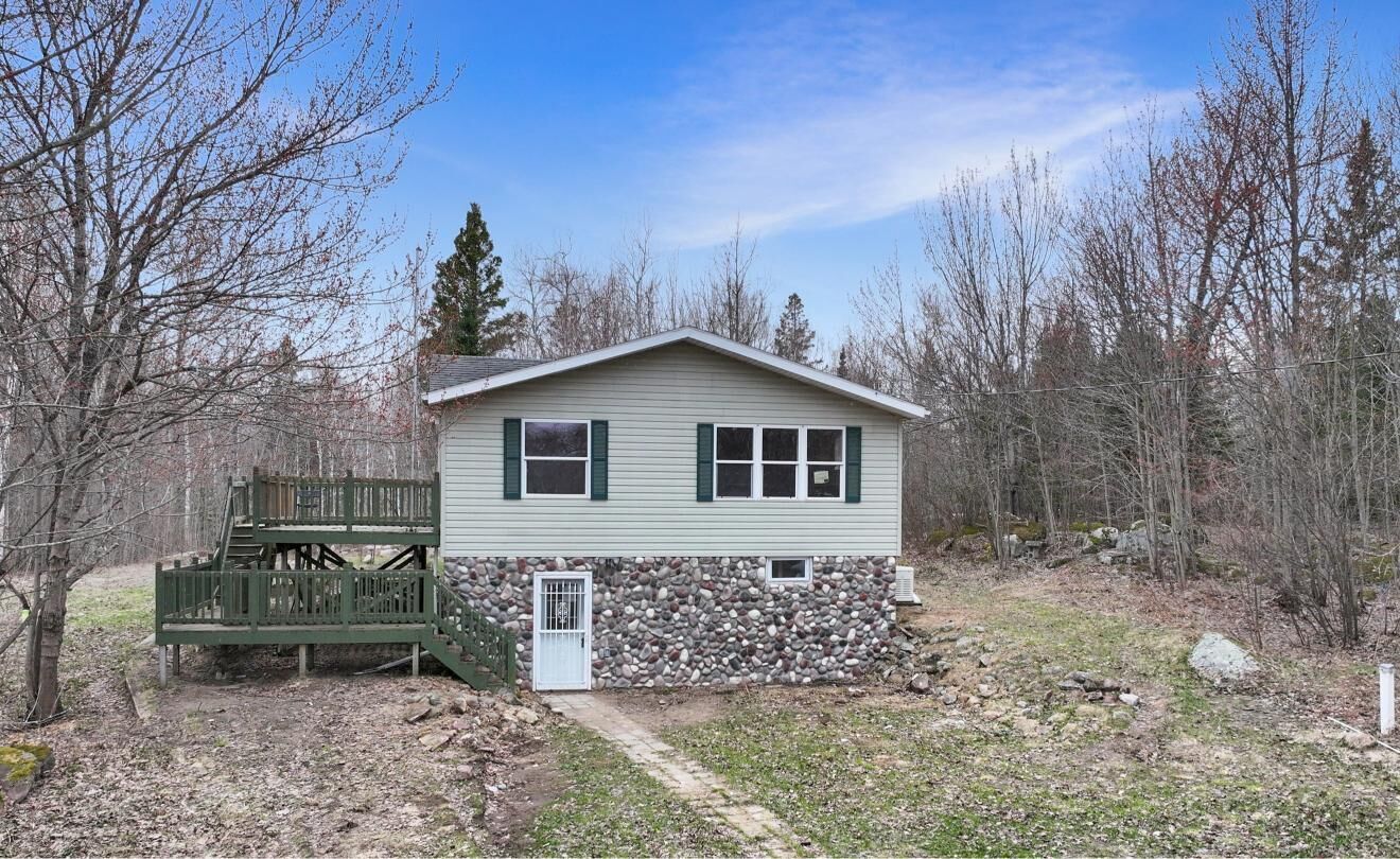Property Photo: 10810 S Riverside Drive MI 49783