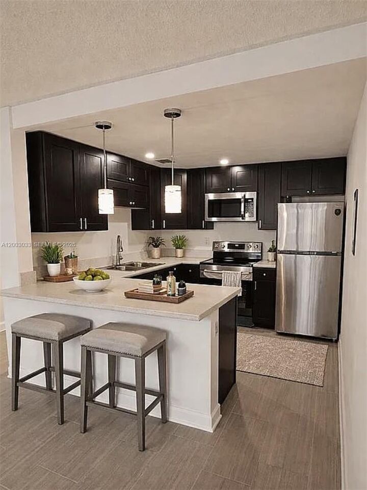 Property Photo:  10400 SW 108th Ave A215  FL 33176 