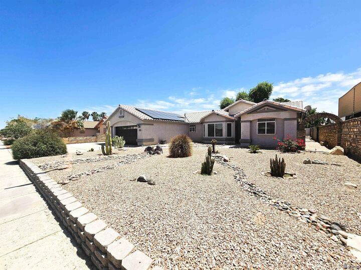 Property Photo: 10711 E 36 Pl AZ 85365