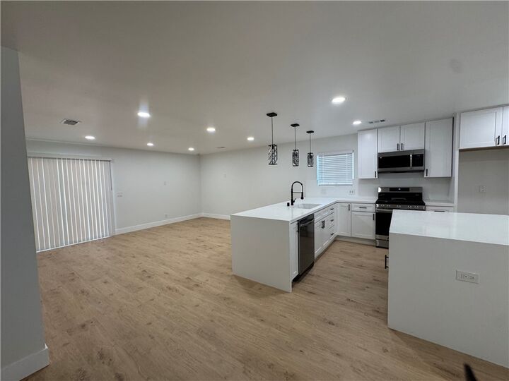 Property Photo:  1873 W Broadway  CA 92804 
