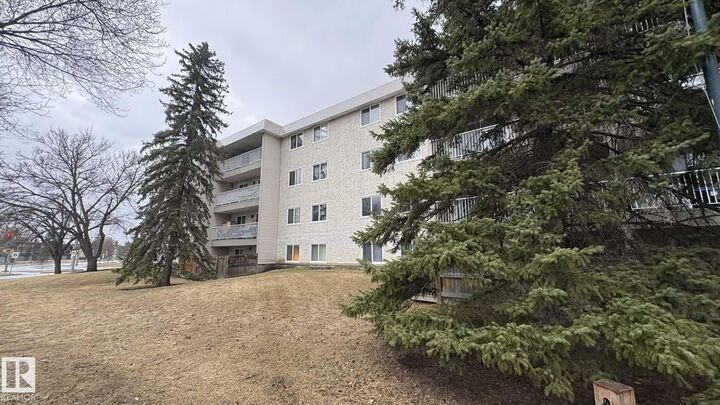 Property Photo: 5125 Riverbend Road NW 203 AB T6H 5K5