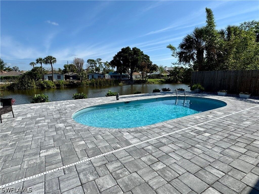 Property Photo: 829 107th Avenue N Unit 1 FL 34108