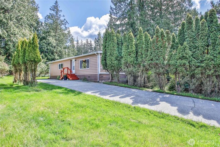 3239 Mardell Drive in Langley, a Saratoga Beach community home with private beach access