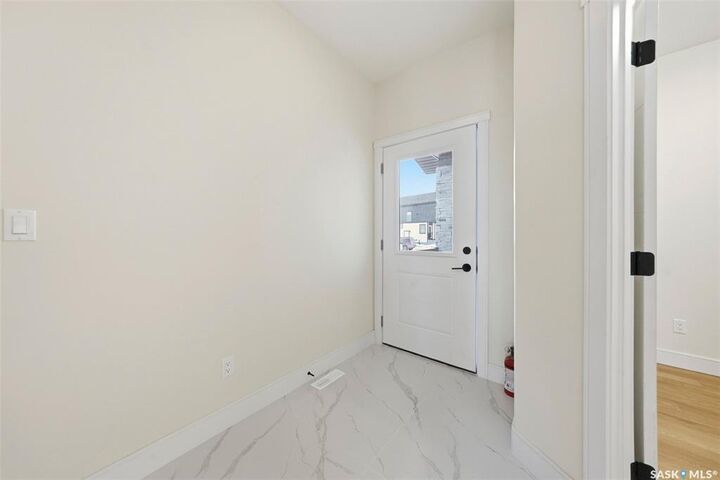 Property Photo: 335 Sharma Crescent SK S7W 1J1