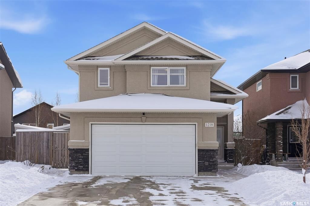 Property Photo:  1218 Rempel Crescent  SK S7T 0M2 