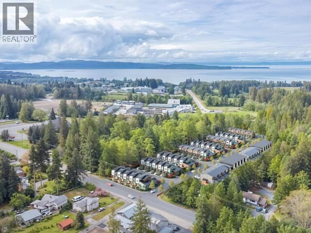 Property Photo:  103-5191 Manson Ave  BC V8A 3P2 