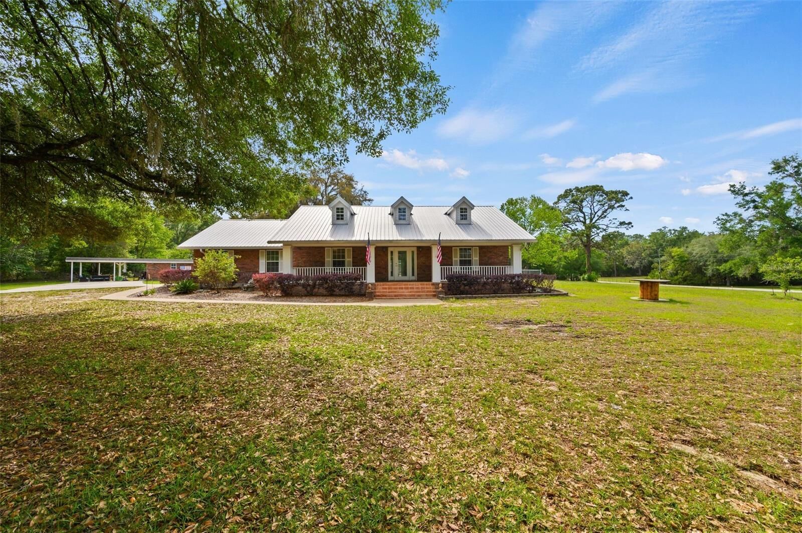 Property Photo:  6459 SE County Road 337  FL 32669 