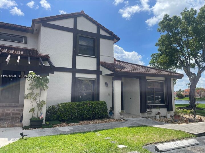 Property Photo:  15292 SW 46th Ln Dr 64  FL 33185 