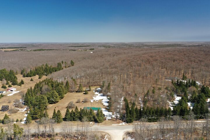 Property Photo:  5505 N 3 Mile Rd  MI 49745 