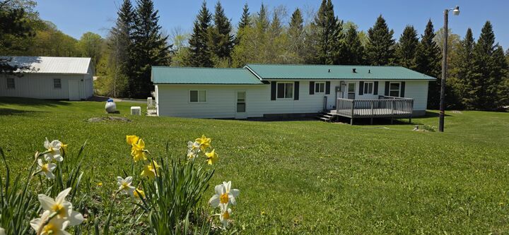 Property Photo:  5505 N 3 Mile Rd  MI 49745 