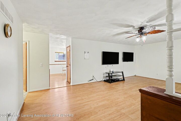 Property Photo:  3678 Trianon Trail  MI 48842 