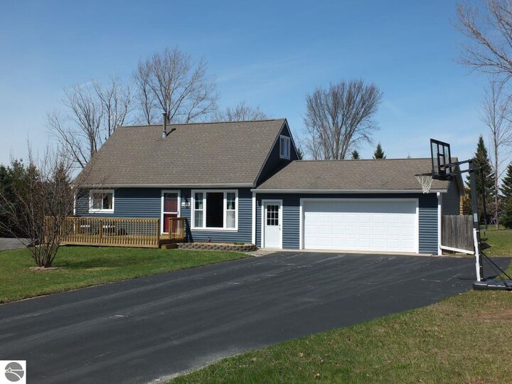 Property Photo:  6468 Rolling Meadows Drive  MI 49684 